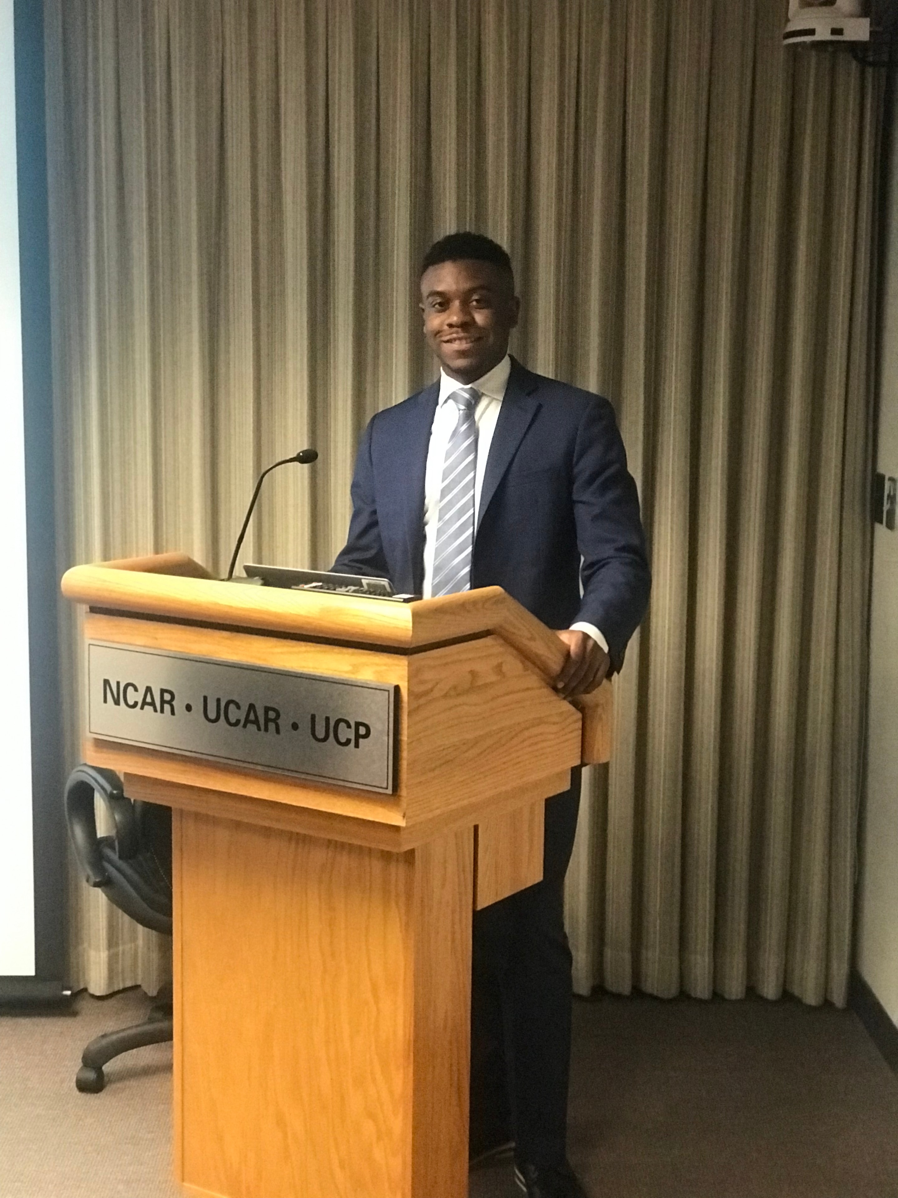 Anthony Wilson speaking at the NCAR/UCAR podium